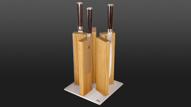 
                    The magnetic knife block accommodates up to 10 knives