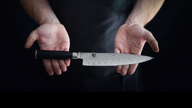 
                    scalloped chefs knife fits nicely in hands