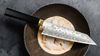 
                    The Ensei Kiritsuke is ideal for finely chopping herbs and for precisely portioning meat and fish