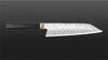 
                    Ensei Kiritsuke’s gold-coloured bolster, inspired by the ‘habaki’ – a metal collar at the junction between the handle and the blade on samurai swords