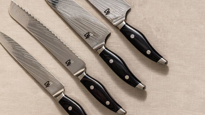 
                    Nagare Black Chef's knife from the Kai Shun Nagare damask knife series