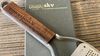 
                    Coarse Grater refined with en engraving on the walnut handle