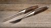 
                    swiss steak cutlery walnut made of surgical steel